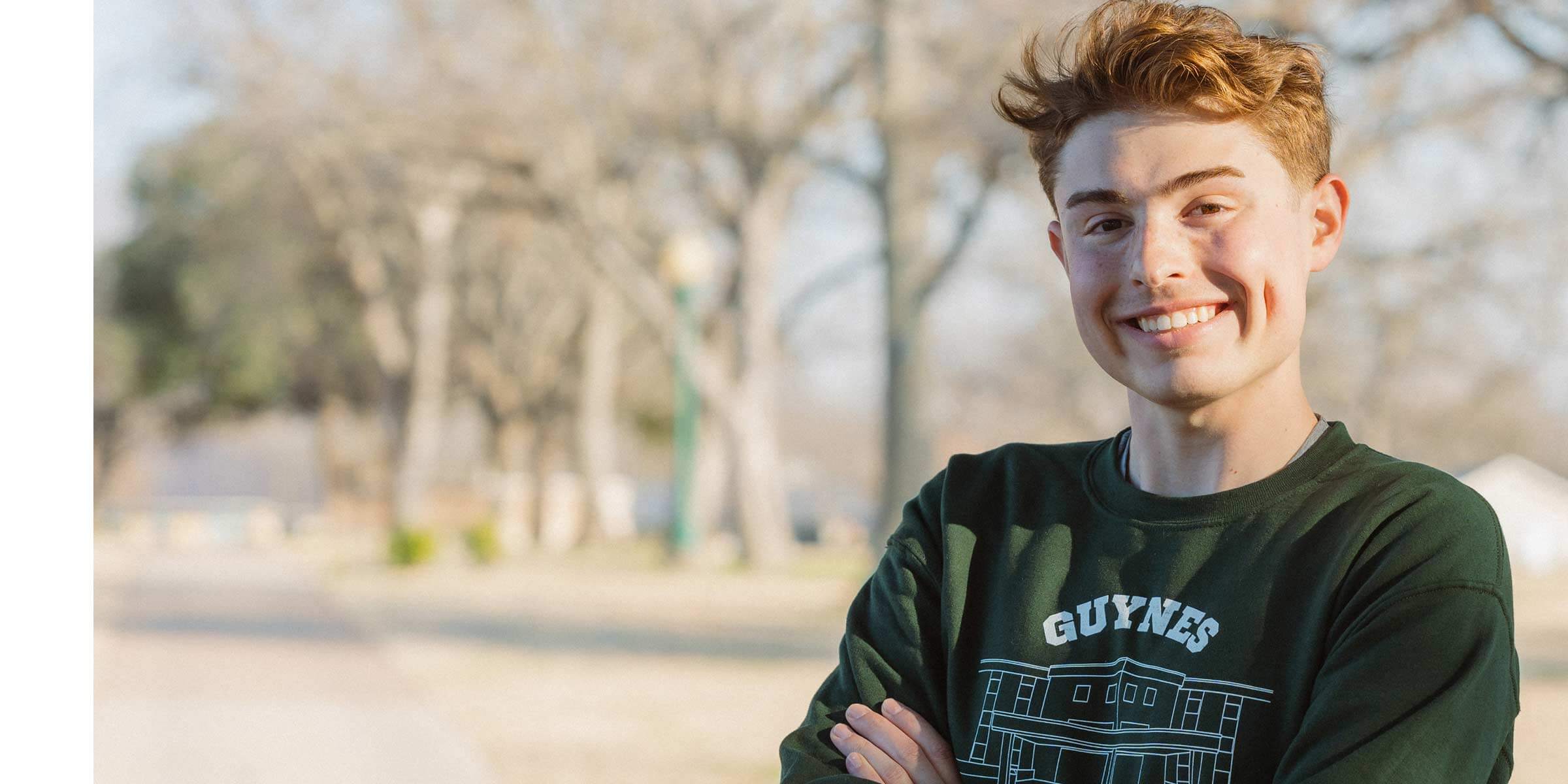 Male Nelson University student on campus.